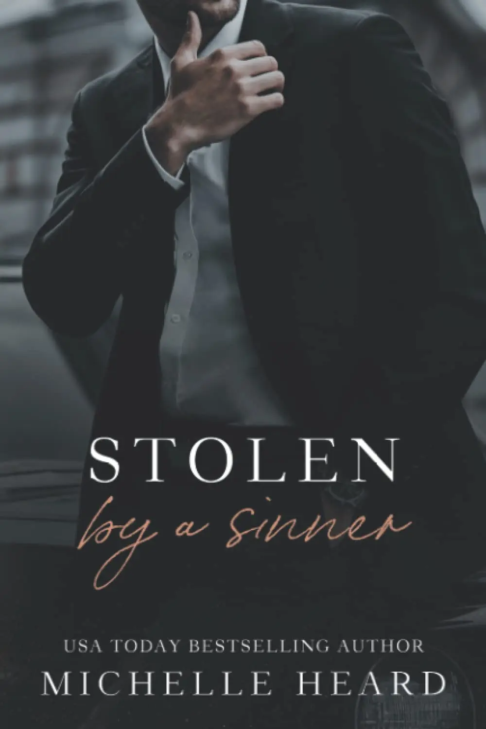 Stolen by a Sinner by Michelle Heard | A Dark and Intense Romance Novel